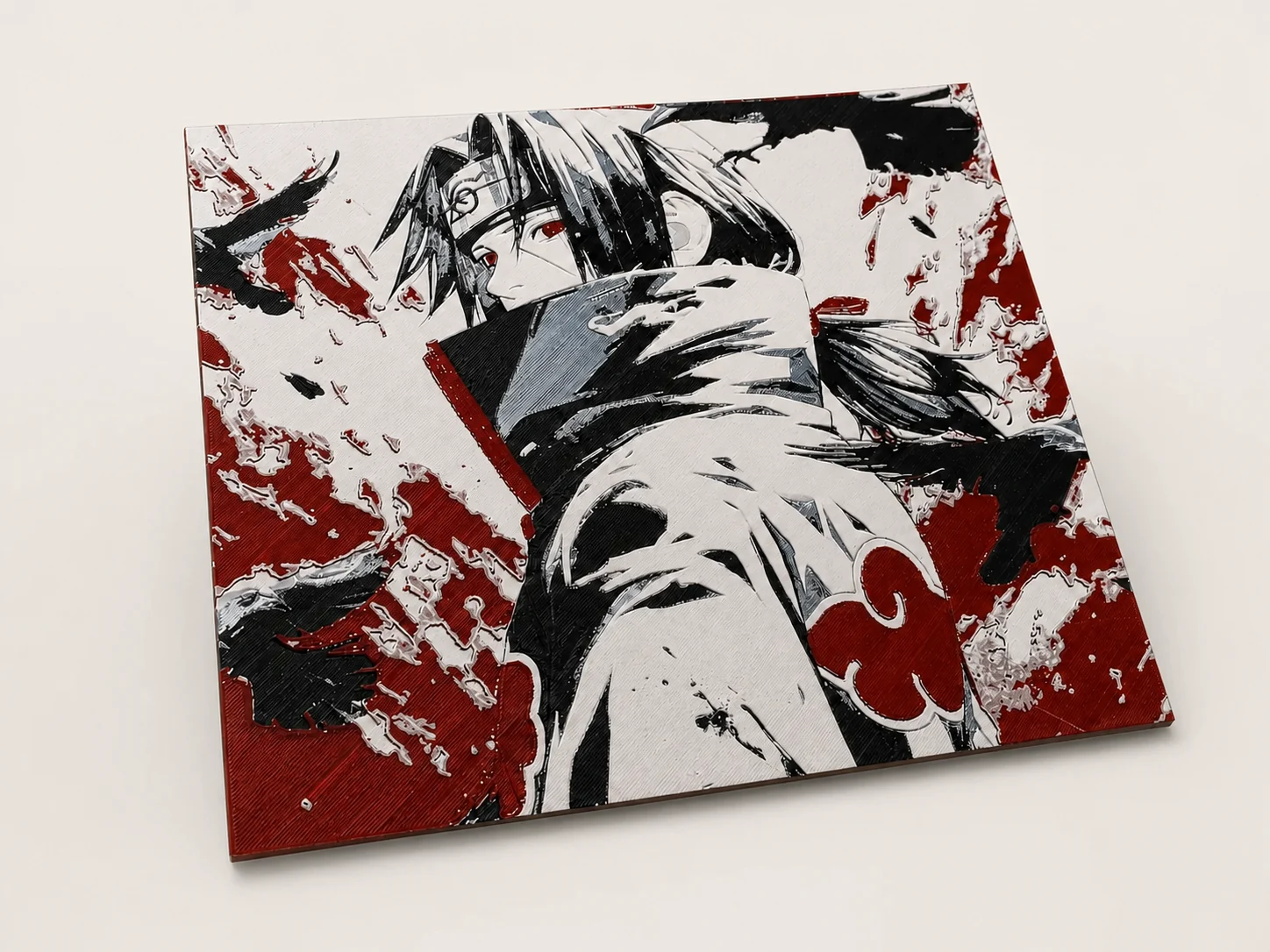 Cadre en relief 3D d'un personnage de manga, rouge, noir et blanc