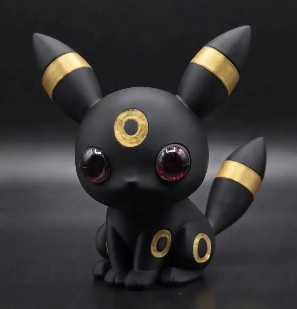 Figurine Noctali imprimée en 3D et peinte à la main, noir avec anneaux jaunes lumineux