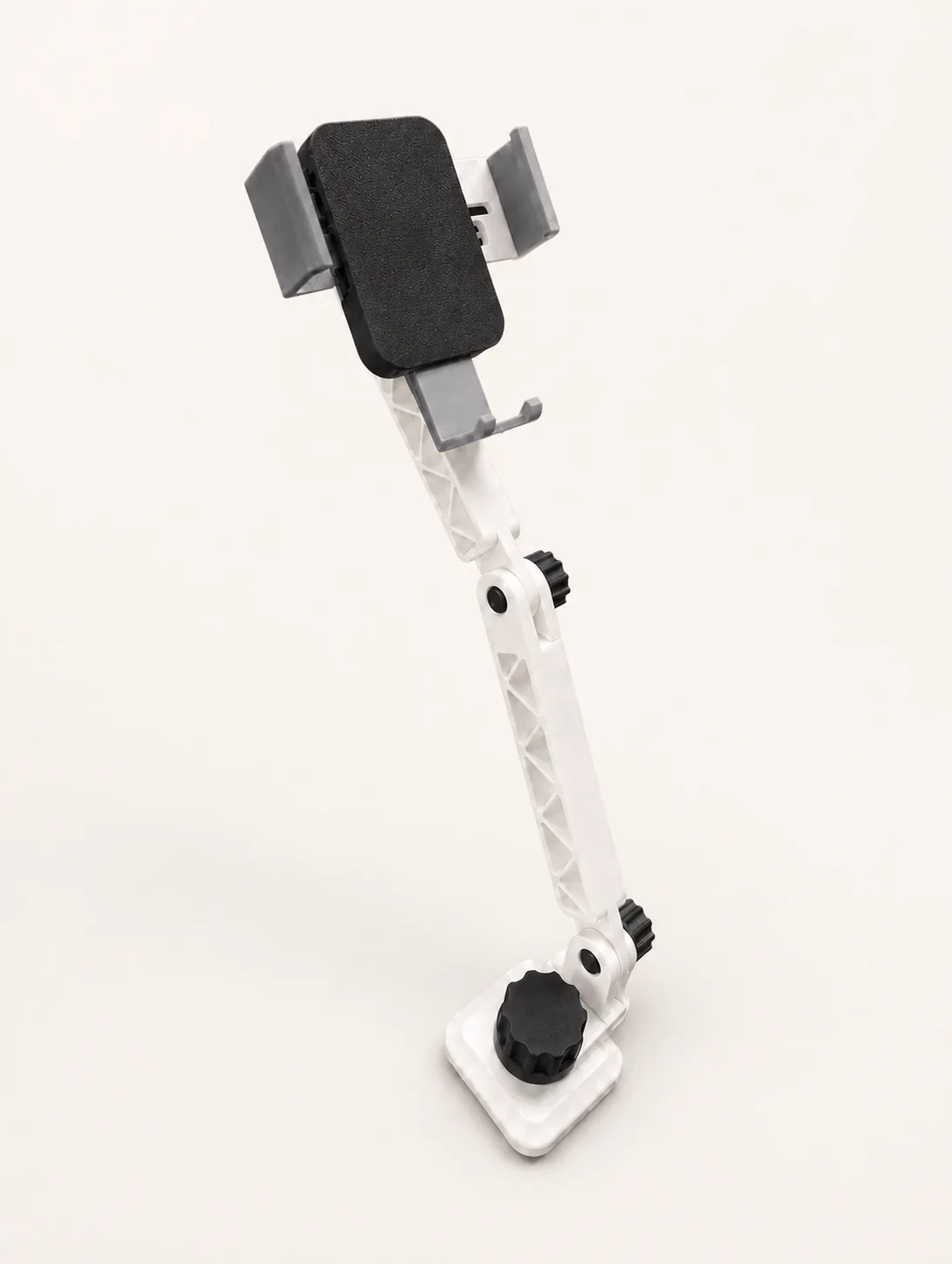 Support de téléphone blanc imprimé en 3D, composé de deux bras articulés et de molettes noires